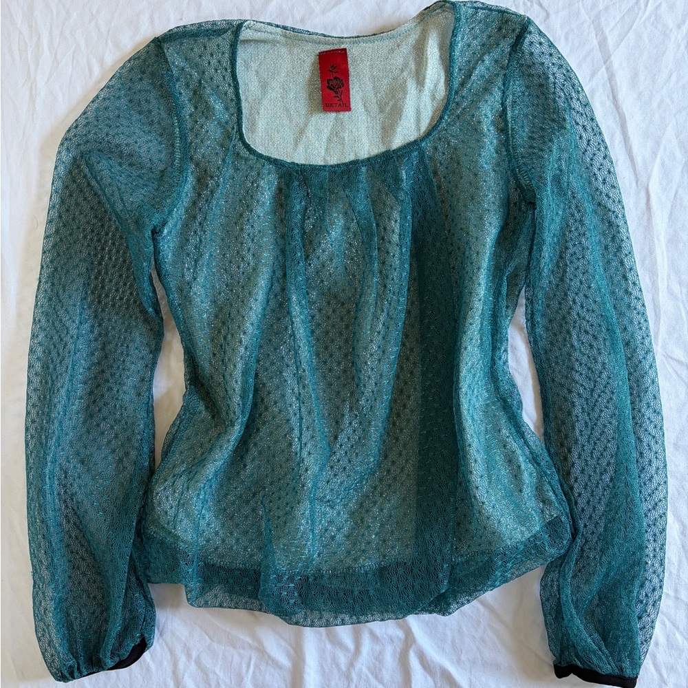 Sheer Sparkly Emerald Green Bubble Hem Long Sleeve Details